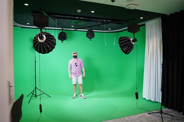 Guest taking a photo in Studio HQ during Fairfield City HQ launch