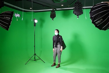 Guest using the green screen during the launch of Fairfield City HQ