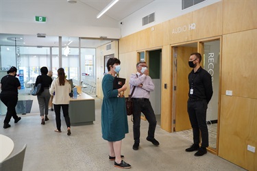 Guests laughing during the launch of Fairfield City HQ