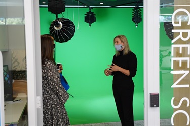 Guests standing inside Studio HQ during the launch of Fairfield City HQ