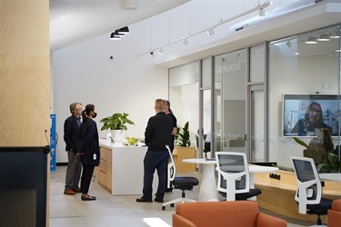 View of hot desks and kitchen facilities in Fairfield City HQ