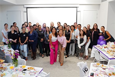 Guest speaker Jenny Dinh with Deputy Mayor Dai Le and guests pose for a photo during International Womens Day High Tea in Fairfield City HQ