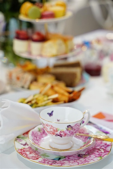 High Tea cup saucer and food at International Womens Day event in Fairfield City HQ