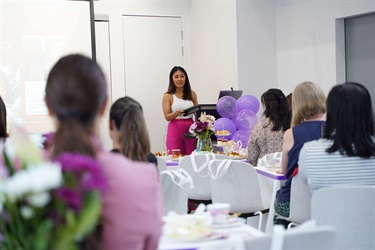 Jenny Dinh speaking at International Womens Day High Tea in Fairfield City HQ