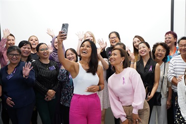 Jenny Dinh takes selfie with Deputy Mayor Dai Le and guests during International Womens Day High Tea in Fairfield City HQ