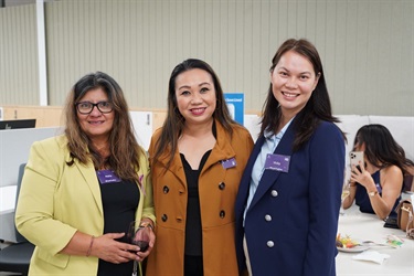 Attendees-posing-for-a-photo-during-International-Womens-Day-After-5-Networking-event-at-Fairfield-City-HQ.jpg