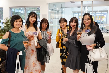 Guests-posing-for-a-photo-during-International-Womens-Day-After-5-Networking-event-at-Fairfield-City-HQ.jpg