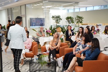 MC-Davie-Nguyen-speaking-to-the-crowd-during-International-Womens-Day-After-5-Networking-event-in-Fairfield-City-HQ.jpg