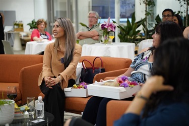 Smiling-guest-at-International-Womens-Day-After-5-Networking-event-in-Fairfield-City-HQ.jpg