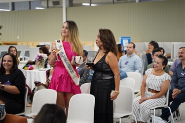 Special-guests-standing-holding-a-glass-of-wine-during-International-Womens-Day-After-5-Networking-event-in-Fairfield-City-HQ.jpg