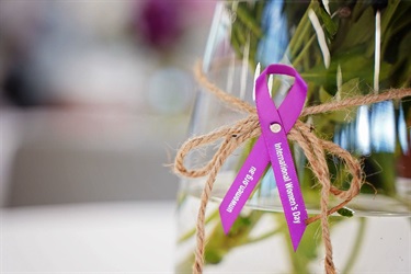 Up-close-image-of-International-Womens-Day-purple-ribbon.jpg