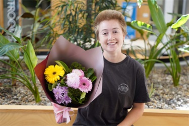 Attendee at the flower workshop for International Women's Day 2023