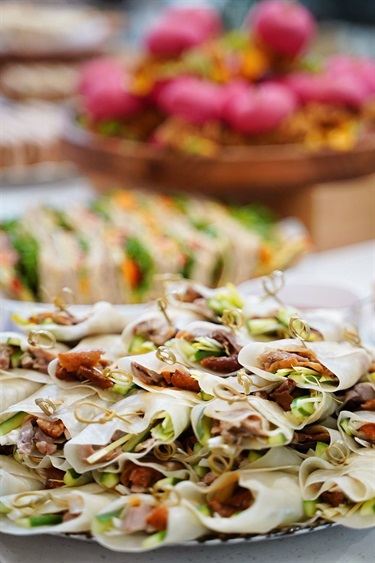Catering platters of wraps and sandwiches