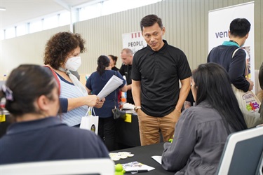 Chatting with participants at SkillsRoad Expo at Fairfield City HQ