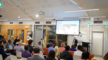 Photo of Fairfield City Council staff speaking at Small Business Month event 2023 at Fairfield City HQ