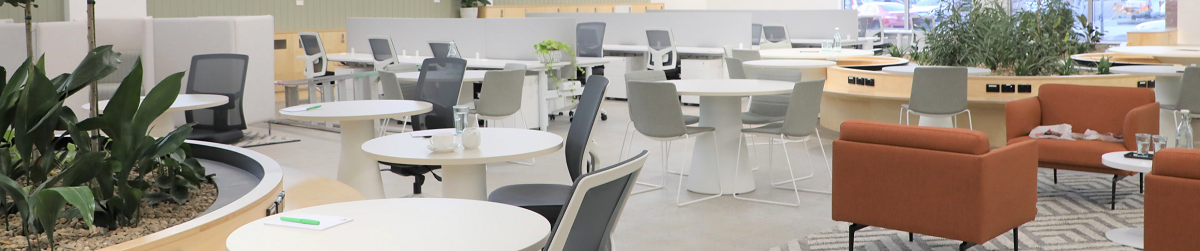 Tables, chairs and lounges inside the Community Hub Space in Fairfield City HQ